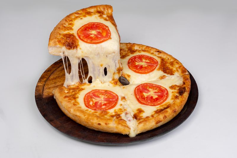 Four Cheese pizza with mozzarella ricotta parmesan and gorgonzola